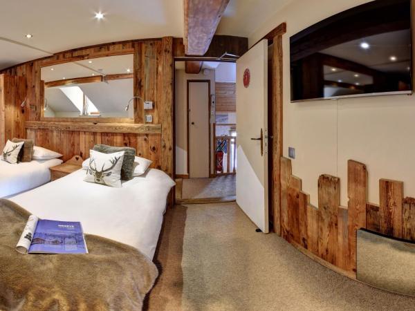 Hôtel Les Cimes : photo 1 de la chambre chambre familiale