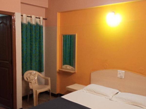 SRI VIJAYA PALACE LODGING : photo 2 de la chambre chambre lit king-size deluxe