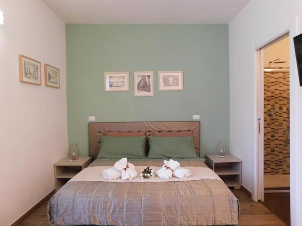 Porta alla Croce Guest House : photo 3 de la chambre chambre double ou lits jumeaux avec salle de bains privative