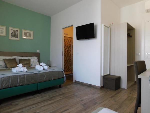 Porta alla Croce Guest House : photo 2 de la chambre chambre double ou lits jumeaux avec salle de bains privative