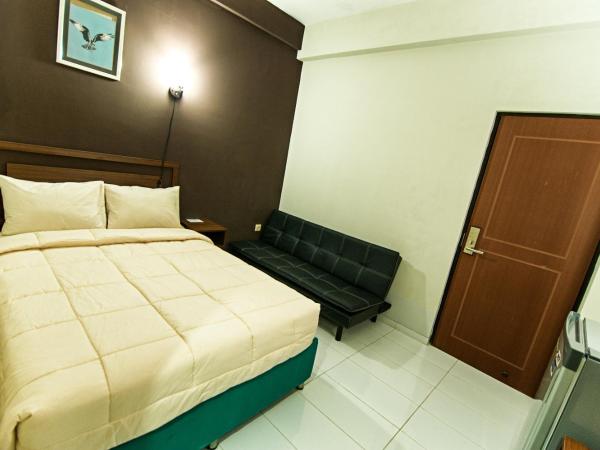 Grace Setia Hotel : photo 1 de la chambre chambre triple deluxe