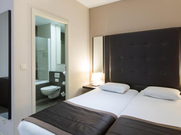Hotel Chambord : photo 3 de la chambre chambre lits jumeaux standard