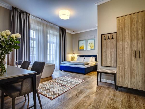 Joyinn Aparthotel : photo 7 de la chambre appartement avec baignoire