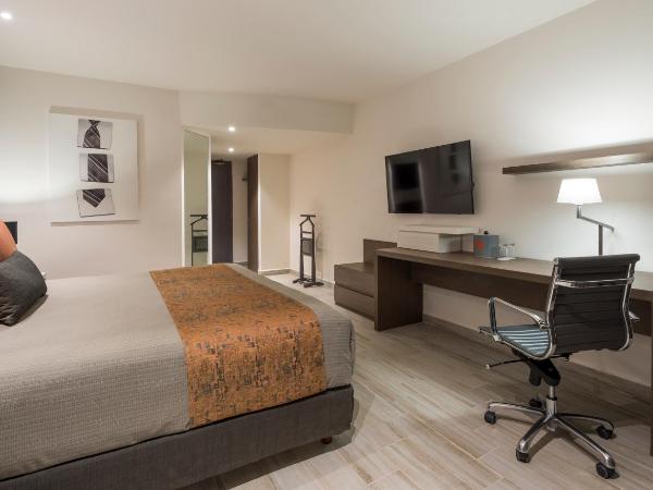 Real Inn Perinorte : photo 3 de la chambre chambre lit king-size de luxe 