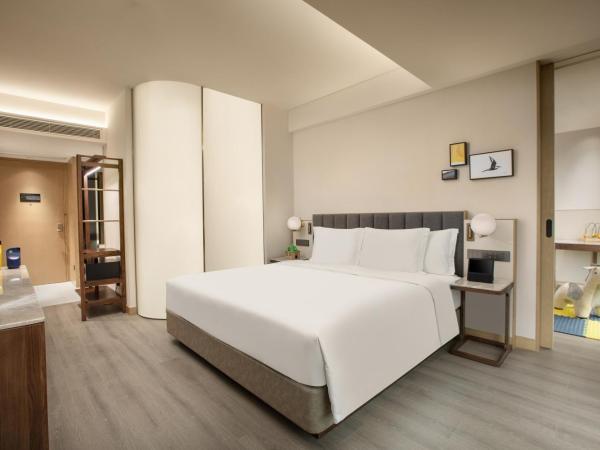 voco Nanjing Oriental Pearl : photo 1 de la chambre 1 king and 1 single premium kids theme