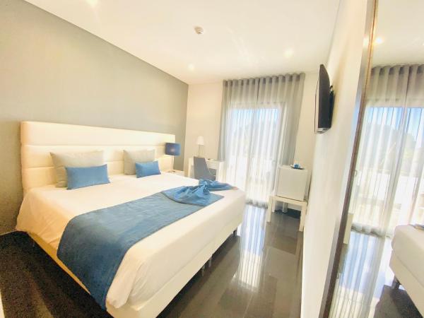 Sunfield Guest House - Only Adults : photo 2 de la chambre chambre double ou lits jumeaux