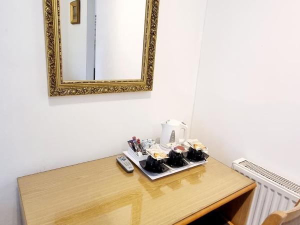 The Guards Hotel : photo 4 de la chambre chambre triple