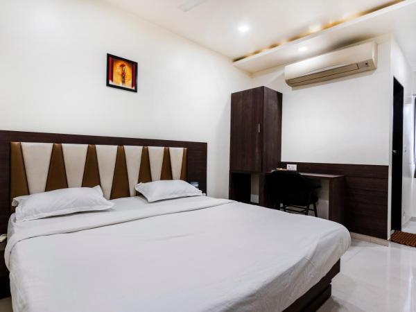 Hotel Ashish : photo 7 de la chambre chambre deluxe double ou lits jumeaux