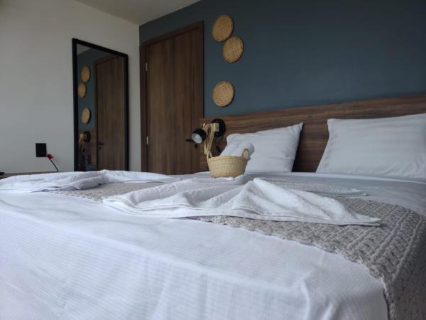 Malai Boutique Hotel : photo 4 de la chambre suite lit queen-size - vue sur piscine