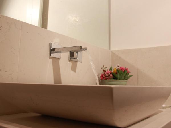 InChiostro Rooms&Breakfast : photo 9 de la chambre chambre lits jumeaux - vue sur jardin