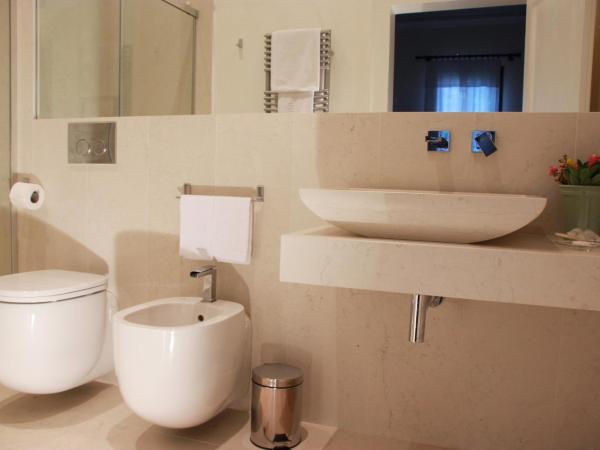 InChiostro Rooms&Breakfast : photo 5 de la chambre chambre lits jumeaux - vue sur jardin