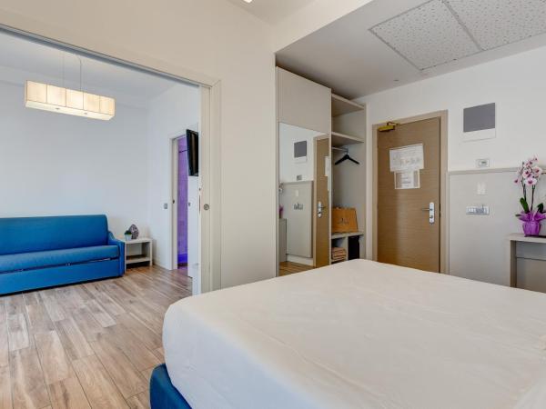 Hotel Nettuno : photo 2 de la chambre chambre familiale supérieure