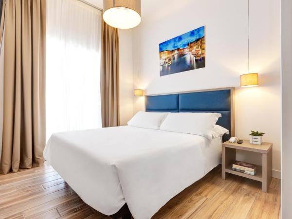 Hotel Nettuno : photo 3 de la chambre chambre familiale supérieure