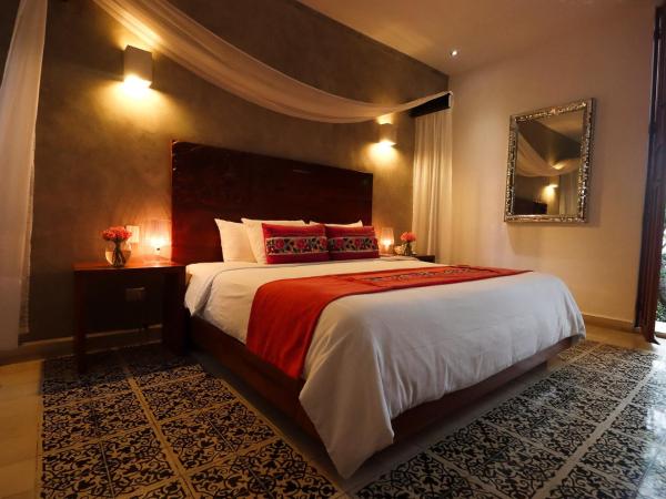 Casa de Las Palomas Boutique Hotel by Paloma's Hotels - Adults Only : photo 4 de la chambre chambre lit king-size - vue sur jardin