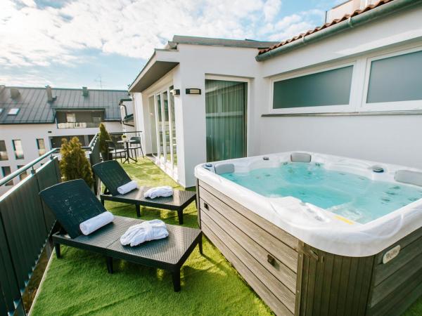 Hotel Auris : photo 5 de la chambre suite deluxe avec baignoire spa