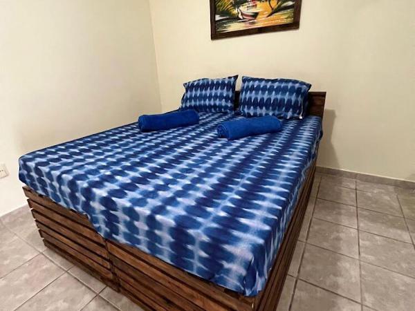 Hostel flor do Caribe : photo 1 de la chambre chambre double ou lits jumeaux avec salle de bains privative