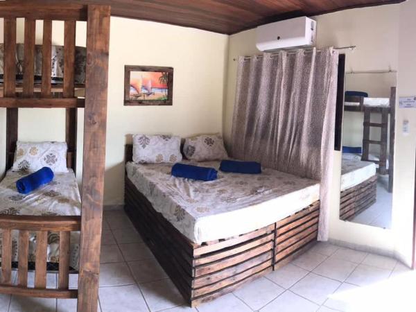 Hostel flor do Caribe : photo 9 de la chambre chambre familiale avec salle de bains privative