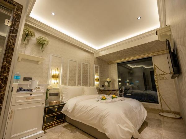 A Residence @ Between Hilton & Cititel Hotel : photo 4 de la chambre chambre double deluxe