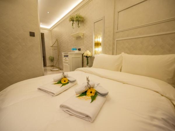 A Residence @ Between Hilton & Cititel Hotel : photo 9 de la chambre chambre double supérieure