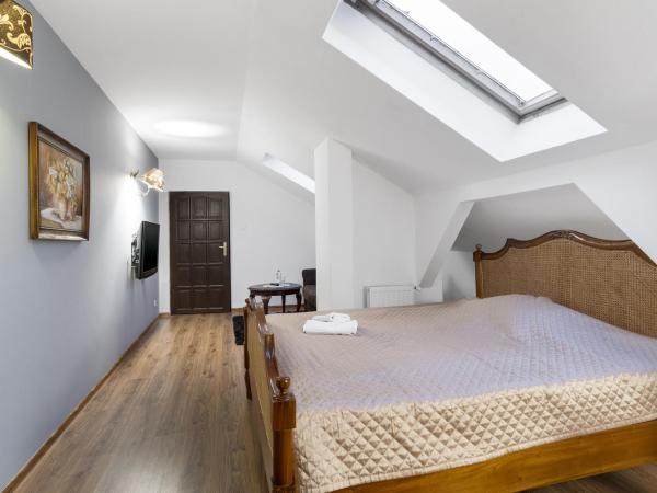 Gosciniec Pod Brzozami : photo 6 de la chambre chambre lit king-size deluxe