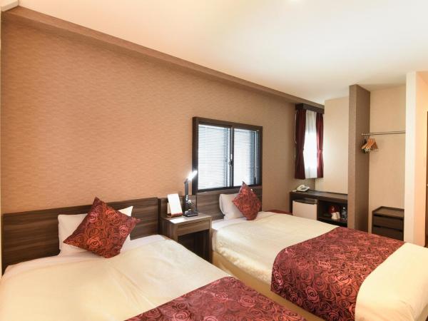 Arima Onsen Koki : photo 2 de la chambre petite chambre lits jumeaux