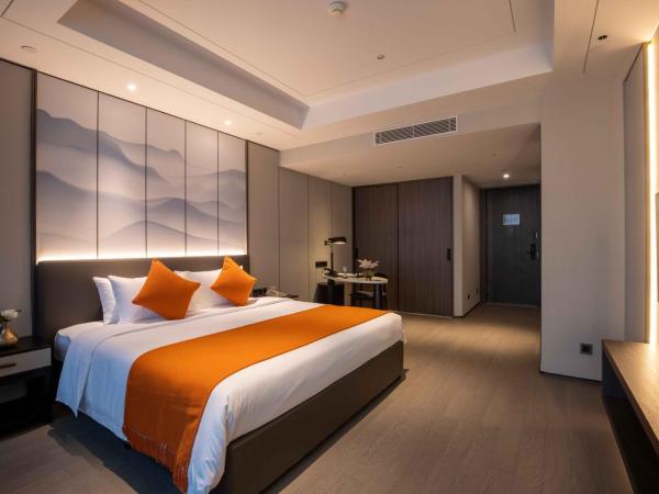 Shanghai Tiancheng Hotel : photo 2 de la chambre chambre lit king-size deluxe