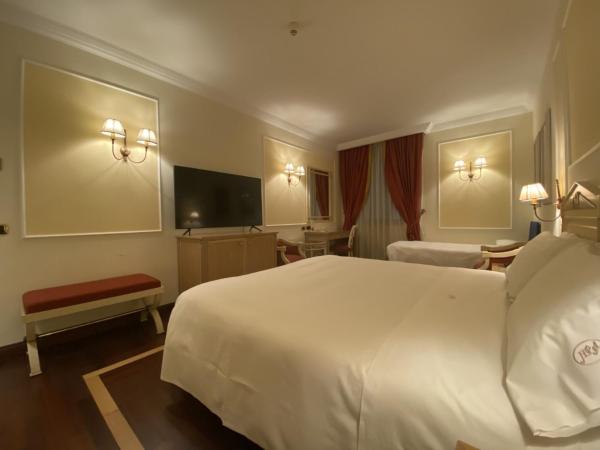 Palazzo Alabardieri : photo 2 de la chambre chambre triple