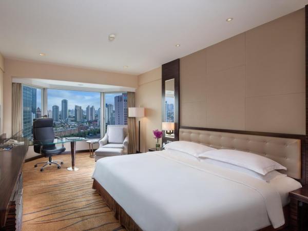 The Kunlun Jing An : photo 2 de la chambre chambre lit king-size deluxe