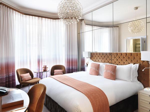 The Athenaeum Hotel & Residences : photo 1 de la chambre chambre supérieure dans maison de ville