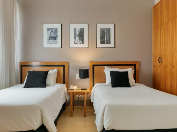 Mercure Belo Horizonte Savassi : photo 1 de la chambre chambre lits jumeaux supérieure