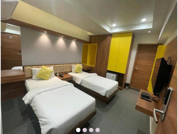 Hotel Avaante Ahmedabad Formerly known as The Orchid Hotel : photo 1 de la chambre chambre lits jumeaux deluxe