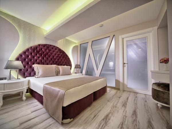 Demonti Hotel : photo 3 de la chambre suite avec jacuzzi