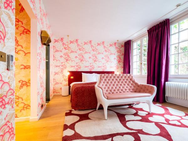 Small Luxury Hotel De Witte Lelie : photo 4 de la chambre chambre lit king-size deluxe
