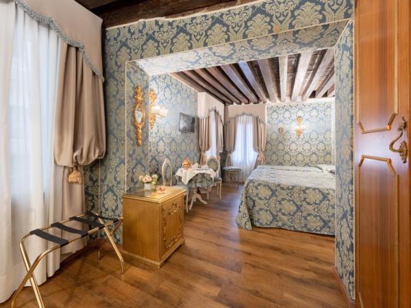 Residenza La Loggia : photo 4 de la chambre chambre triple