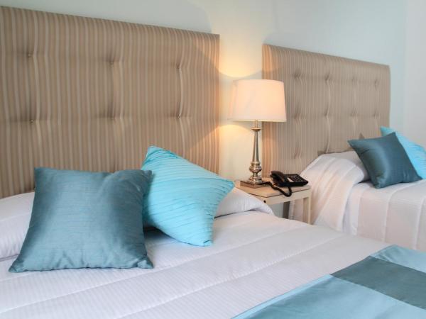 Hotel La Casa de María : photo 5 de la chambre chambre double avec 2 lits doubles