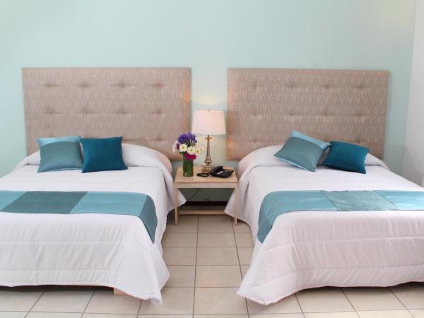 Hotel La Casa de María : photo 6 de la chambre chambre double avec 2 lits doubles