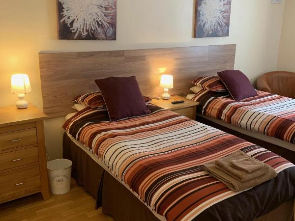 Bedrock Lodge : photo 2 de la chambre chambre lits jumeaux standard avec vue sur jardin