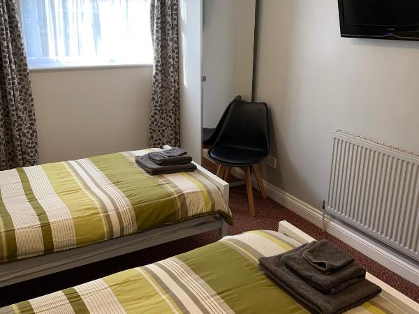 Bedrock Lodge : photo 4 de la chambre chambre lits jumeaux standard avec vue sur jardin