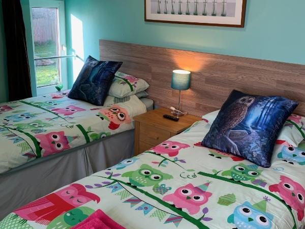 Bedrock Lodge : photo 5 de la chambre chambre lits jumeaux standard avec vue sur jardin