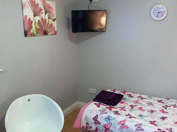 Bedrock Lodge : photo 8 de la chambre chambre lits jumeaux standard avec vue sur jardin