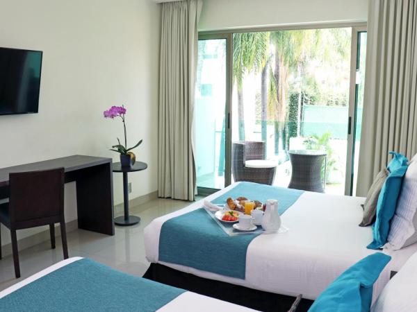 Hotel Rio 1300 : photo 4 de la chambre chambre lits jumeaux standard avec vue sur jardin