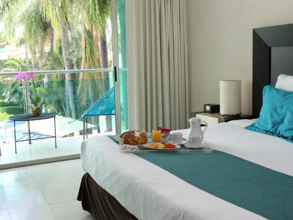 Hotel Rio 1300 : photo 1 de la chambre chambre lit king-size avec balcon