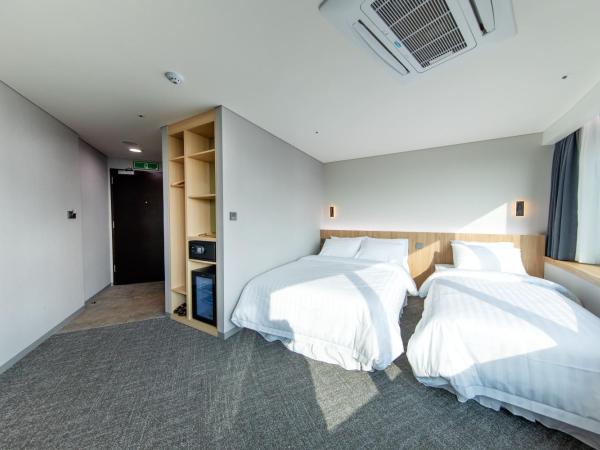 Seoul Olympic Parktel : photo 4 de la chambre chambre lits jumeaux