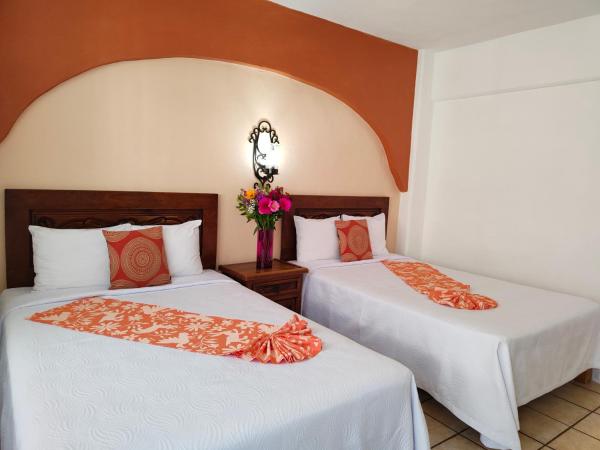 Hotel El Pescador : photo 2 de la chambre chambre lits jumeaux