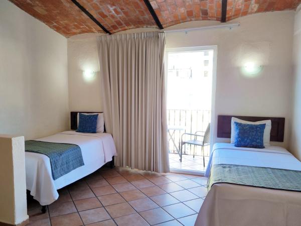 Hotel El Pescador : photo 2 de la chambre chambre familiale standard