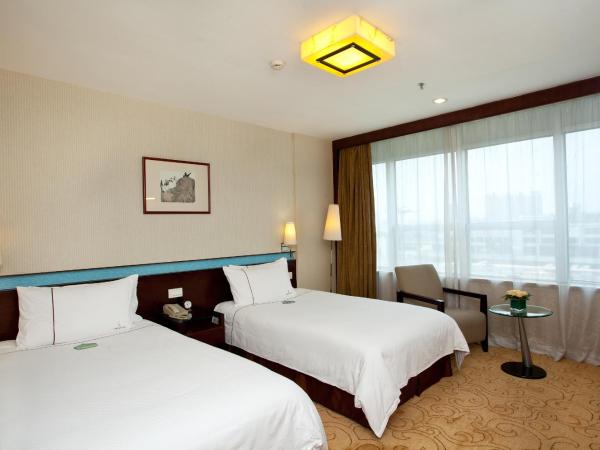 Liuhua Hotel : photo 6 de la chambre chambre lits jumeaux deluxe
