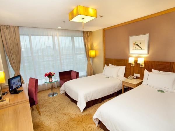 Liuhua Hotel : photo 4 de la chambre chambre lits jumeaux standard