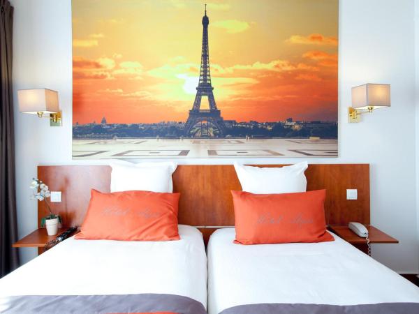 Alyss Saphir Cambronne Eiffel : photo 10 de la chambre chambre lits jumeaux