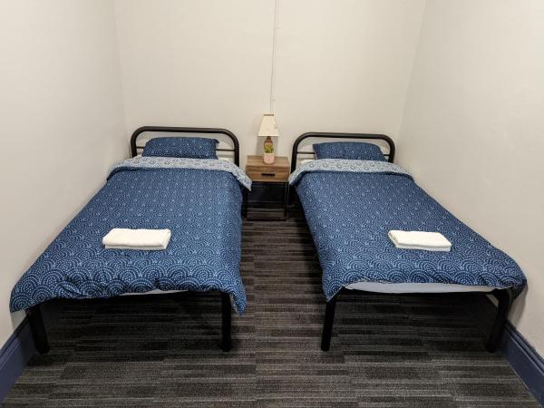 Queen Victoria Hostel : photo 5 de la chambre chambre lits jumeaux standard
