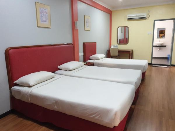 Classic Boutique Hotel Kuantan : photo 7 de la chambre premium triple-3 room